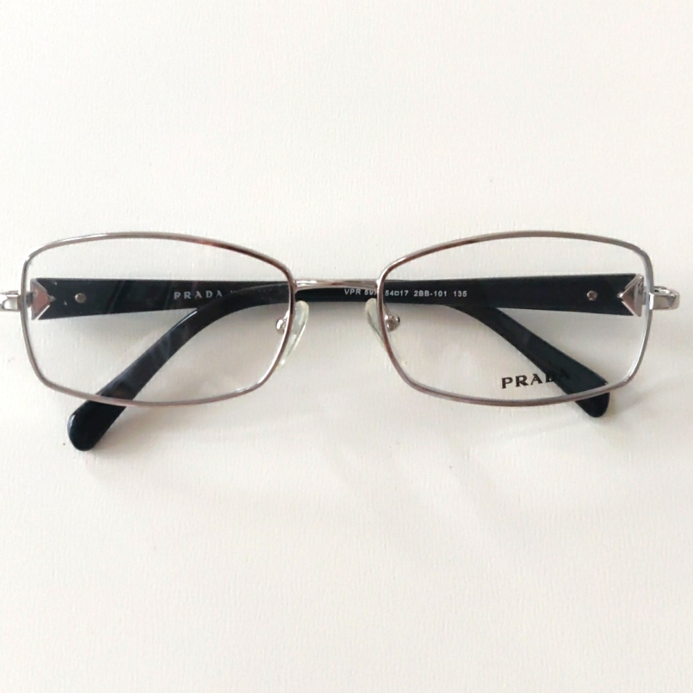 Prada 59NV Glasses. Silver 54-17-135